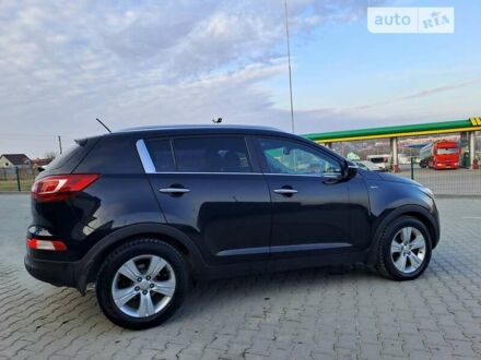 Чорний Кіа Sportage, об'ємом двигуна 2 л та пробігом 128 тис. км за 12100 $, фото 1 на Automoto.ua