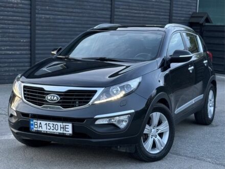 Чорний Кіа Sportage, об'ємом двигуна 2 л та пробігом 218 тис. км за 12499 $, фото 1 на Automoto.ua