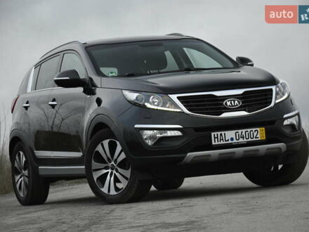 Чорний Кіа Sportage, об'ємом двигуна 2 л та пробігом 245 тис. км за 14700 $, фото 1 на Automoto.ua