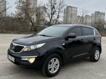 Чорний Кіа Sportage, об'ємом двигуна 2 л та пробігом 148 тис. км за 12600 $, фото 1 на Automoto.ua