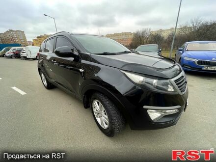 Чорний Кіа Sportage, об'ємом двигуна 2 л та пробігом 105 тис. км за 12500 $, фото 1 на Automoto.ua