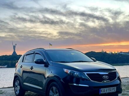 Черный Киа Sportage, объемом двигателя 2.4 л и пробегом 180 тыс. км за 12000 $, фото 1 на Automoto.ua