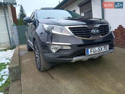 Черный Киа Sportage, объемом двигателя 2 л и пробегом 209 тыс. км за 14599 $, фото 1 на Automoto.ua