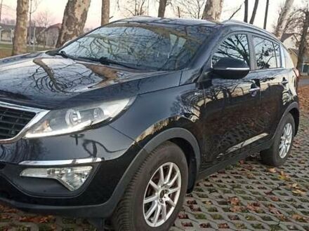 Чорний Кіа Sportage, об'ємом двигуна 2 л та пробігом 259 тис. км за 13350 $, фото 1 на Automoto.ua