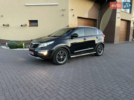 Чорний Кіа Sportage, об'ємом двигуна 2 л та пробігом 212 тис. км за 13970 $, фото 1 на Automoto.ua