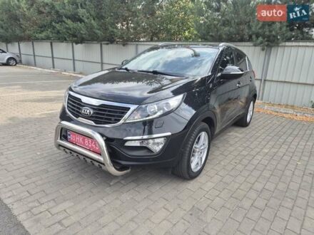 Чорний Кіа Sportage, об'ємом двигуна 2 л та пробігом 174 тис. км за 16799 $, фото 1 на Automoto.ua