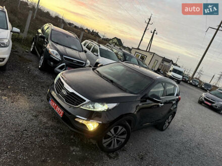 Чорний Кіа Sportage, об'ємом двигуна 2 л та пробігом 205 тис. км за 15500 $, фото 1 на Automoto.ua