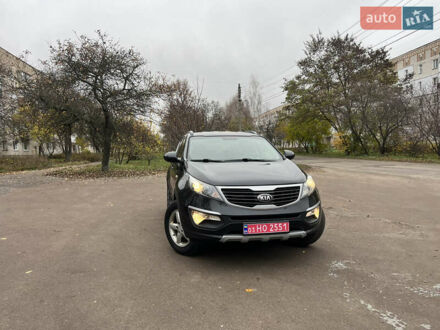 Черный Киа Sportage, объемом двигателя 1.6 л и пробегом 185 тыс. км за 11900 $, фото 1 на Automoto.ua