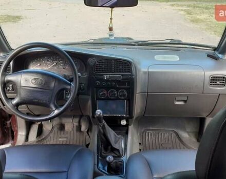 Фиолетовый Киа Sportage, объемом двигателя 2 л и пробегом 310 тыс. км за 4500 $, фото 5 на Automoto.ua