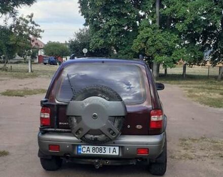 Фиолетовый Киа Sportage, объемом двигателя 2 л и пробегом 310 тыс. км за 4500 $, фото 9 на Automoto.ua