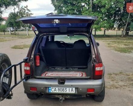 Фиолетовый Киа Sportage, объемом двигателя 2 л и пробегом 310 тыс. км за 4500 $, фото 6 на Automoto.ua