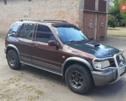 Фиолетовый Киа Sportage, объемом двигателя 2 л и пробегом 310 тыс. км за 4500 $, фото 8 на Automoto.ua