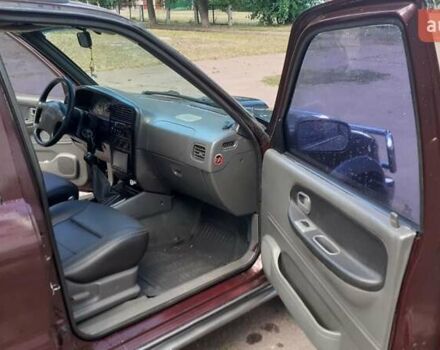 Фиолетовый Киа Sportage, объемом двигателя 2 л и пробегом 310 тыс. км за 4500 $, фото 3 на Automoto.ua