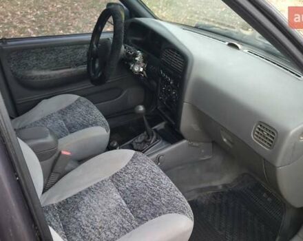 Фіолетовий Кіа Sportage, об'ємом двигуна 2 л та пробігом 155 тис. км за 3600 $, фото 6 на Automoto.ua