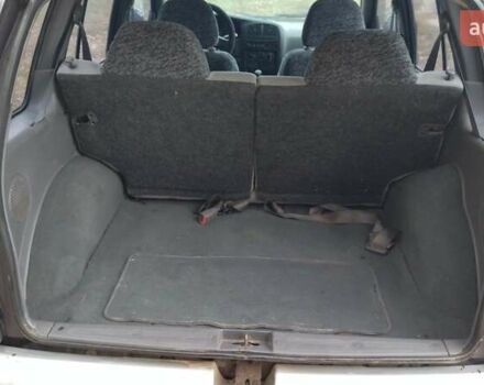 Фіолетовий Кіа Sportage, об'ємом двигуна 2 л та пробігом 155 тис. км за 3600 $, фото 11 на Automoto.ua