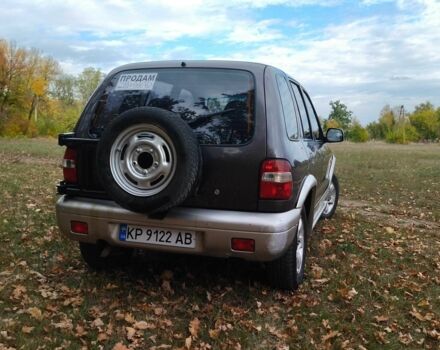 Фіолетовий Кіа Sportage, об'ємом двигуна 2 л та пробігом 200 тис. км за 3600 $, фото 5 на Automoto.ua