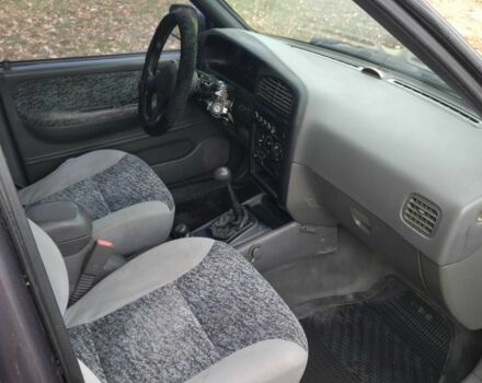 Фіолетовий Кіа Sportage, об'ємом двигуна 2 л та пробігом 200 тис. км за 3600 $, фото 6 на Automoto.ua