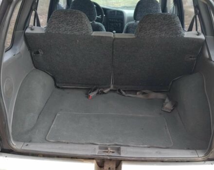 Фіолетовий Кіа Sportage, об'ємом двигуна 2 л та пробігом 200 тис. км за 3600 $, фото 11 на Automoto.ua