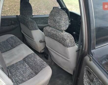 Фіолетовий Кіа Sportage, об'ємом двигуна 2 л та пробігом 155 тис. км за 3600 $, фото 9 на Automoto.ua