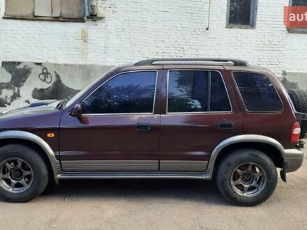 Фиолетовый Киа Sportage, объемом двигателя 2 л и пробегом 310 тыс. км за 4500 $, фото 1 на Automoto.ua