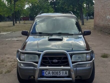 Фиолетовый Киа Sportage, объемом двигателя 2 л и пробегом 310 тыс. км за 4300 $, фото 1 на Automoto.ua