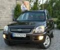 Коричневий Кіа Sportage, об'ємом двигуна 1.99 л та пробігом 254 тис. км за 7299 $, фото 2 на Automoto.ua