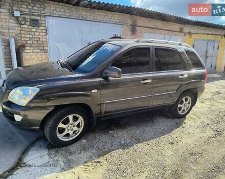 Коричневий Кіа Sportage, об'ємом двигуна 1.99 л та пробігом 242 тис. км за 8700 $, фото 1 на Automoto.ua