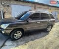Коричневий Кіа Sportage, об'ємом двигуна 1.99 л та пробігом 242 тис. км за 8700 $, фото 1 на Automoto.ua