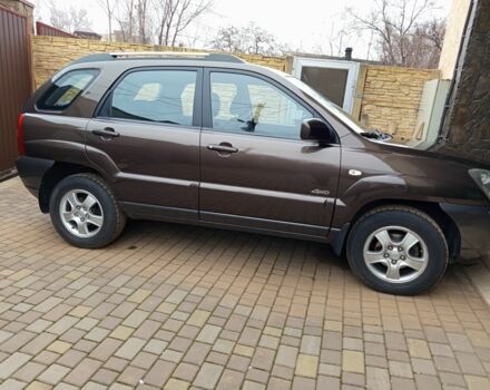 Коричневый Киа Sportage, объемом двигателя 2 л и пробегом 249 тыс. км за 9000 $, фото 1 на Automoto.ua