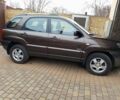 Коричневый Киа Sportage, объемом двигателя 2 л и пробегом 249 тыс. км за 9000 $, фото 1 на Automoto.ua