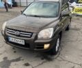 Коричневый Киа Sportage, объемом двигателя 2 л и пробегом 241 тыс. км за 8000 $, фото 1 на Automoto.ua