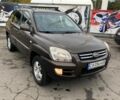 Коричневый Киа Sportage, объемом двигателя 2 л и пробегом 241 тыс. км за 8000 $, фото 1 на Automoto.ua