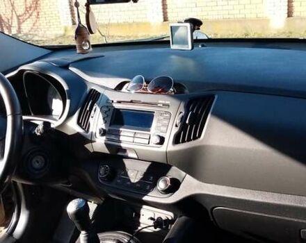 Коричневий Кіа Sportage, об'ємом двигуна 2 л та пробігом 103 тис. км за 12500 $, фото 1 на Automoto.ua