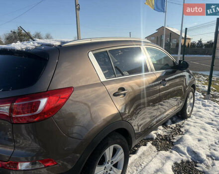 Коричневий Кіа Sportage, об'ємом двигуна 1.6 л та пробігом 236 тис. км за 11600 $, фото 4 на Automoto.ua