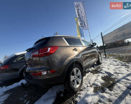 Коричневий Кіа Sportage, об'ємом двигуна 1.6 л та пробігом 236 тис. км за 11600 $, фото 26 на Automoto.ua