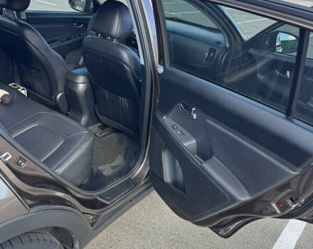 Коричневий Кіа Sportage, об'ємом двигуна 2 л та пробігом 188 тис. км за 14500 $, фото 11 на Automoto.ua