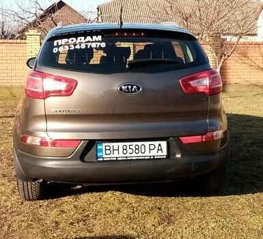 Коричневий Кіа Sportage, об'ємом двигуна 2 л та пробігом 103 тис. км за 12500 $, фото 5 на Automoto.ua
