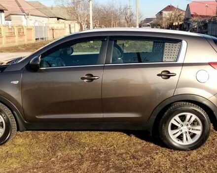 Коричневий Кіа Sportage, об'ємом двигуна 2 л та пробігом 103 тис. км за 12500 $, фото 4 на Automoto.ua