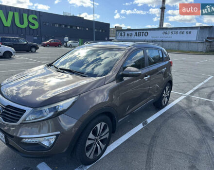 Коричневий Кіа Sportage, об'ємом двигуна 2 л та пробігом 188 тис. км за 14500 $, фото 2 на Automoto.ua