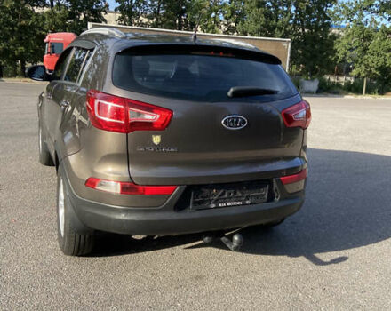 Коричневий Кіа Sportage, об'ємом двигуна 2 л та пробігом 173 тис. км за 11666 $, фото 4 на Automoto.ua