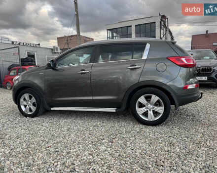 Коричневий Кіа Sportage, об'ємом двигуна 2 л та пробігом 190 тис. км за 13950 $, фото 7 на Automoto.ua