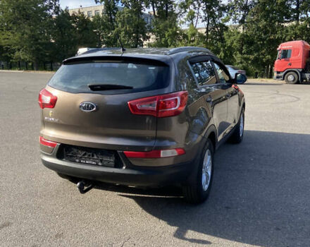 Коричневий Кіа Sportage, об'ємом двигуна 2 л та пробігом 173 тис. км за 11666 $, фото 8 на Automoto.ua