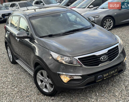 Коричневий Кіа Sportage, об'ємом двигуна 2 л та пробігом 190 тис. км за 13950 $, фото 28 на Automoto.ua