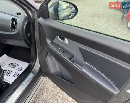 Коричневий Кіа Sportage, об'ємом двигуна 2 л та пробігом 190 тис. км за 13950 $, фото 59 на Automoto.ua