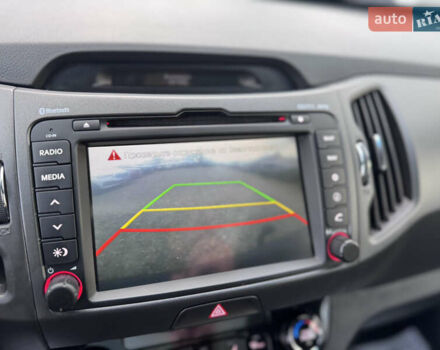 Коричневий Кіа Sportage, об'ємом двигуна 2 л та пробігом 190 тис. км за 13950 $, фото 40 на Automoto.ua