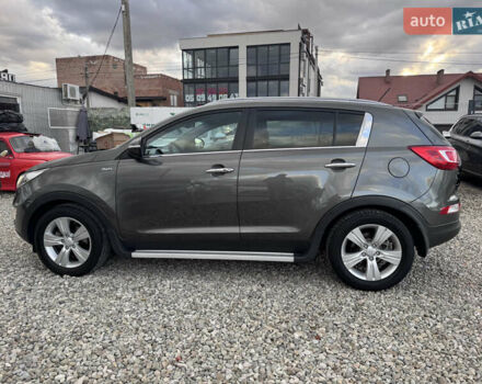 Коричневий Кіа Sportage, об'ємом двигуна 2 л та пробігом 190 тис. км за 13950 $, фото 6 на Automoto.ua