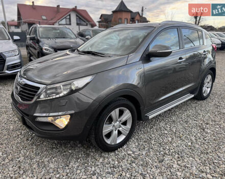 Коричневий Кіа Sportage, об'ємом двигуна 2 л та пробігом 190 тис. км за 13950 $, фото 4 на Automoto.ua