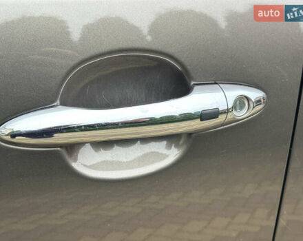 Коричневий Кіа Sportage, об'ємом двигуна 2 л та пробігом 197 тис. км за 14800 $, фото 25 на Automoto.ua