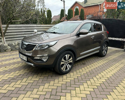 Коричневий Кіа Sportage, об'ємом двигуна 2 л та пробігом 197 тис. км за 14800 $, фото 7 на Automoto.ua