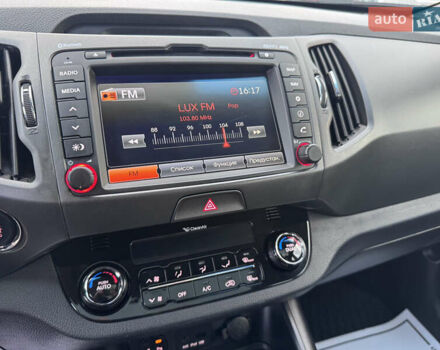 Коричневий Кіа Sportage, об'ємом двигуна 2 л та пробігом 190 тис. км за 13950 $, фото 41 на Automoto.ua